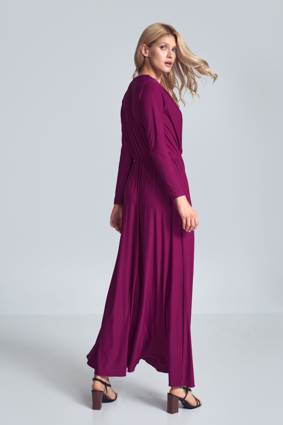 Fuchsia maxi dress with long sleeves, wrap creased neckline, elasticated band sewn in the waist.