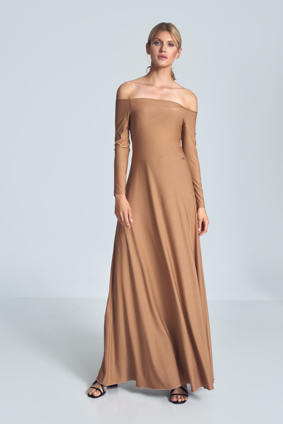 Beige sensual maxi dress with long sleeves, large neckline - cold shoulders, pleats at the bust, sewn at the waist.