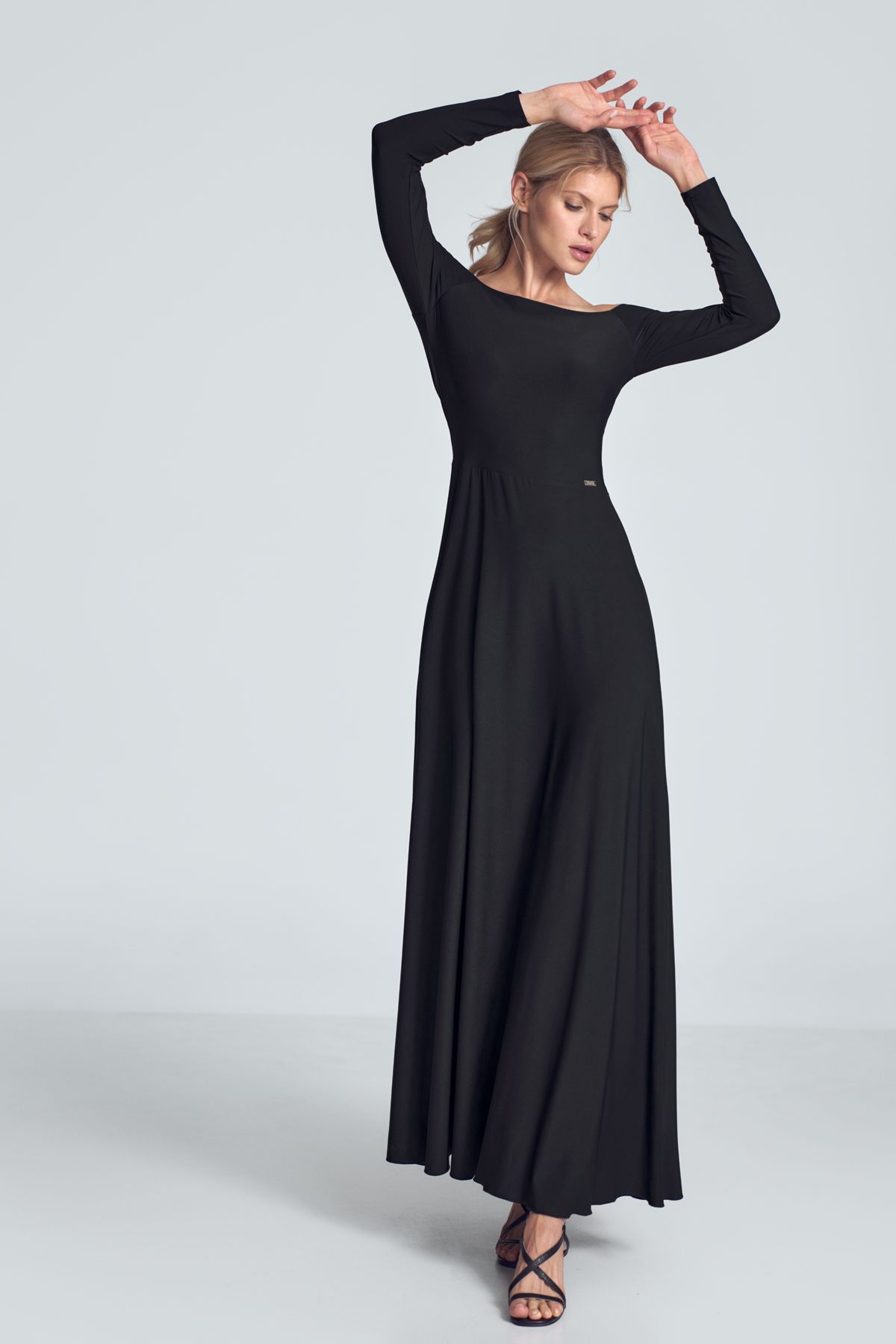 Black sensual maxi dress with long sleeves, large neckline - cold shoulders, pleats at the bust, sewn at the waist.