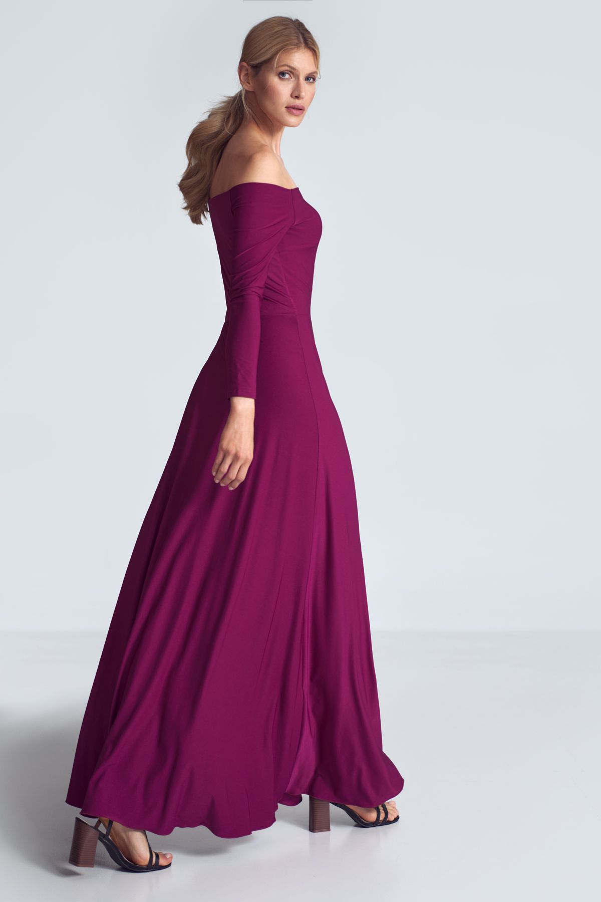 Fuchsia sensual maxi dress with long sleeves, large neckline - cold shoulders, pleats at the bust, sewn at the waist.