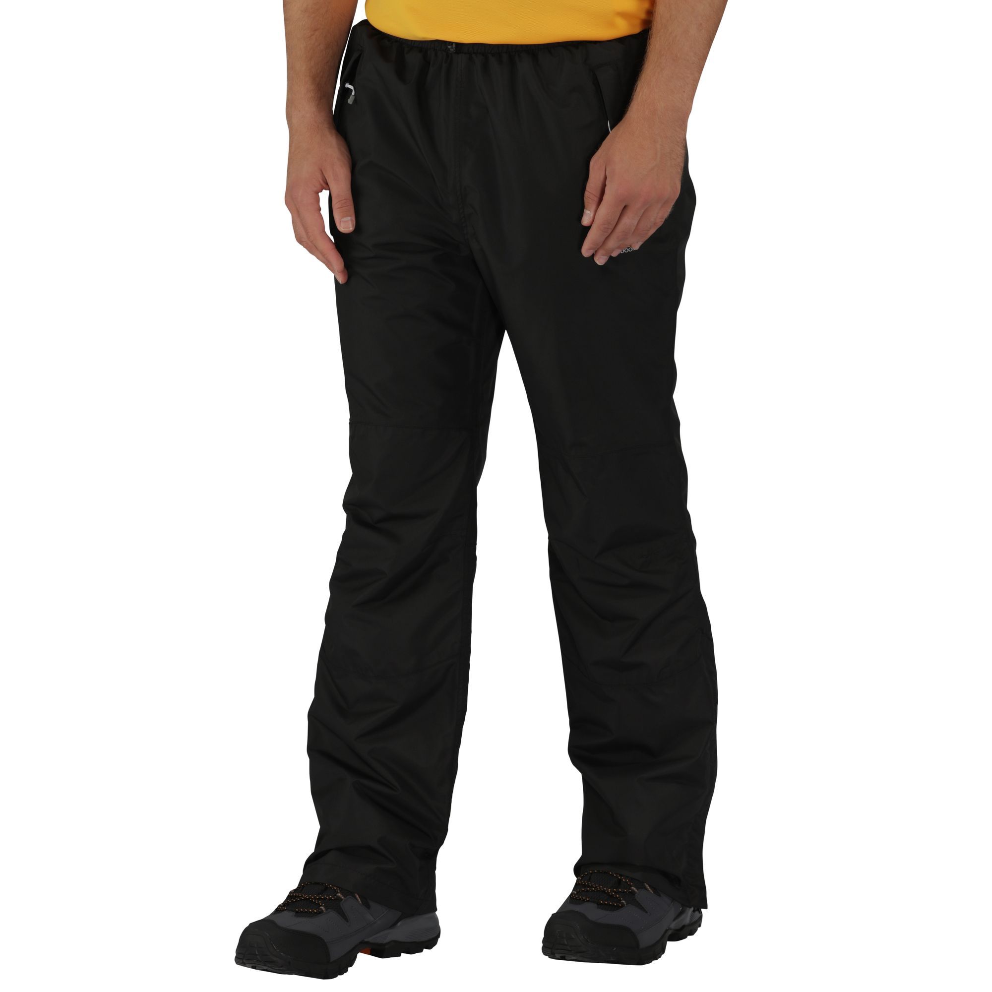 Womens waterproof trousers made of Isotex 5000 coated Polyester fabric. Durable water repellent finish. Part mesh, part Polyester lining. Taped seams. Elasticated and drawcord waist. Zip opening at ankle. Ideal for wearing outdoors in the rain. 100% Polyester. Short: 29in.