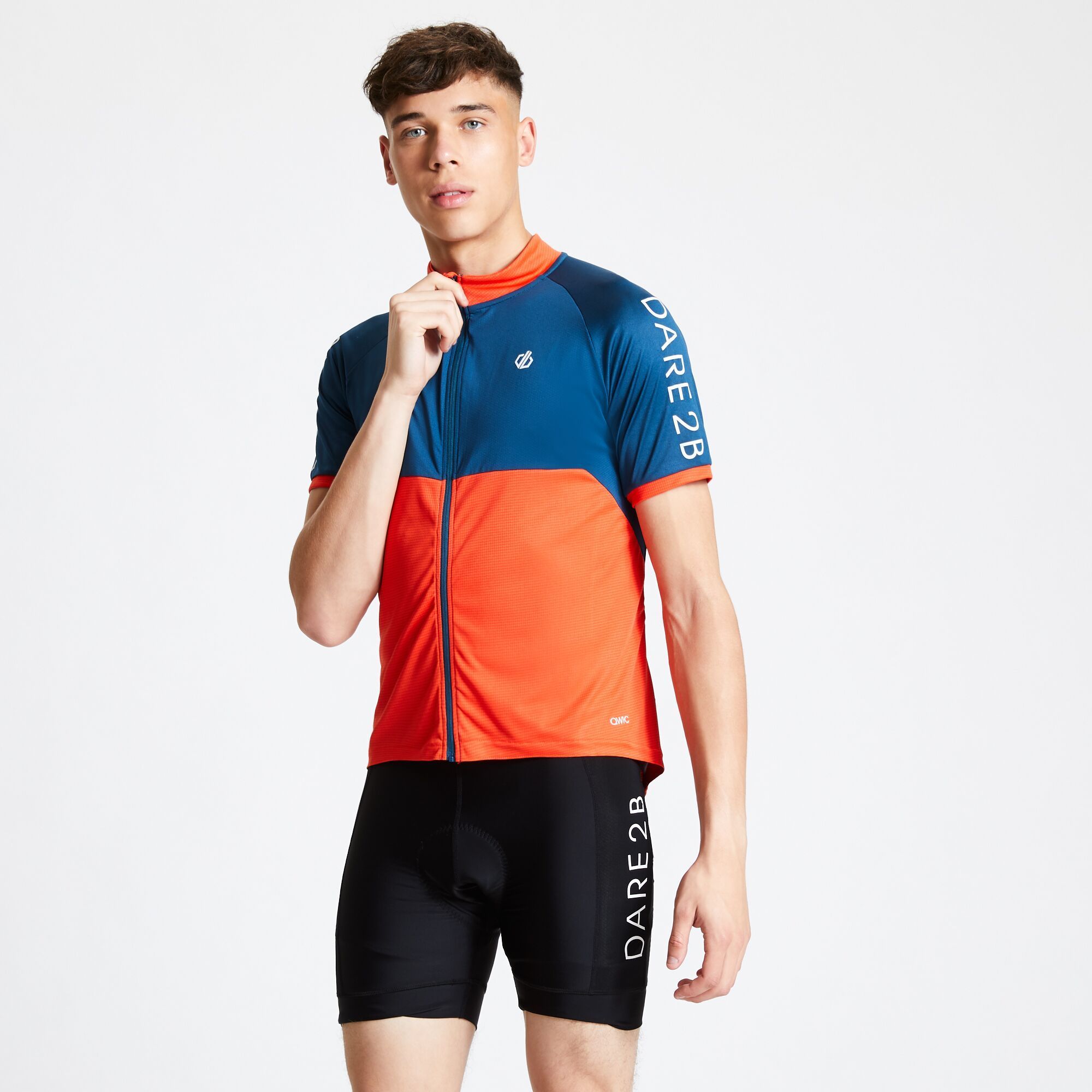 Material: 100% Polyester (Q-Wic Plus lightweight fabric). Soft and light-to-wear, stretch fit short-sleeved cycle jersey. Full-length centre front venting zip with autolock slider and inner grip guard. Long back with scooped elasticated hem. 3 compartment pockets at rear with zipped security pocket.