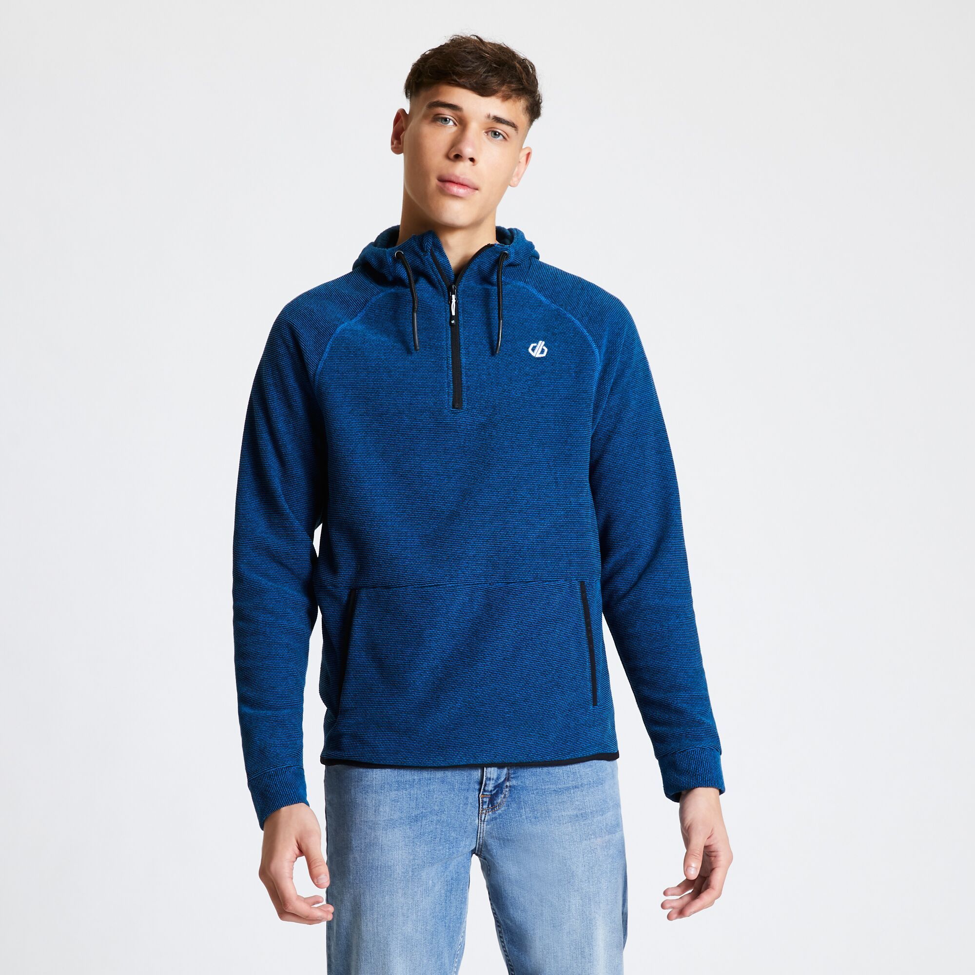 Material: 100% Polyester. Supremely soft hooded fleece with drawcord adjusters. Half zip. Kangaroo pocket to front. Sports-stretch binding around the hem.