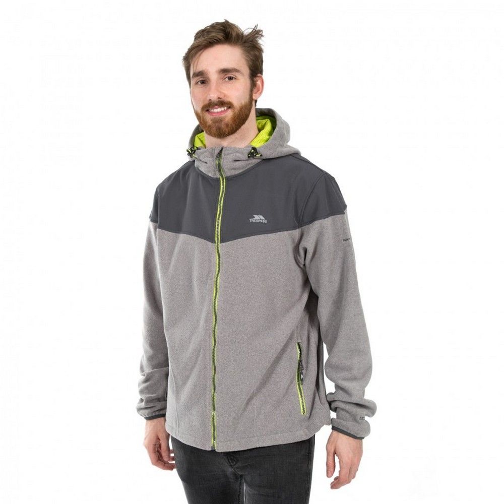 Mens long sleeve fleece with contrast softshell panels. Two zip pockets and contrast zips. Grown on hood. Drawcord at hem and binding at cuff. Fabric: main- 100% Polyester, contrast- 95% Polyester and 5% Elastane, lining- 100% Polyester Mesh. Airtrap: 280gsm. Trespass Mens Chest Sizing (approx): M - 38-40in/96.5-101.5cm, L - 41-43in/104-109cm.