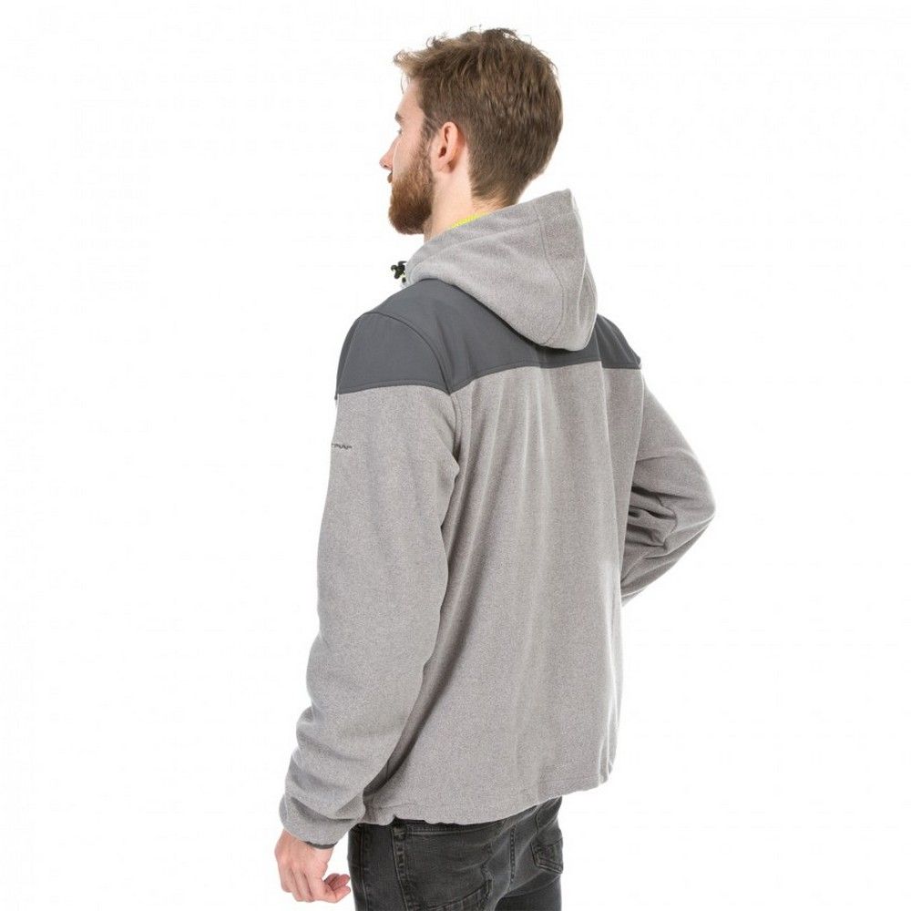 Mens long sleeve fleece with contrast softshell panels. Two zip pockets and contrast zips. Grown on hood. Drawcord at hem and binding at cuff. Fabric: main- 100% Polyester, contrast- 95% Polyester and 5% Elastane, lining- 100% Polyester Mesh. Airtrap: 280gsm. Trespass Mens Chest Sizing (approx): M - 38-40in/96.5-101.5cm, L - 41-43in/104-109cm.