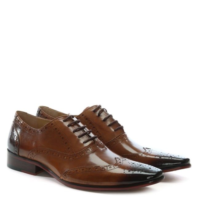 The Daniel Milverton Leather Lace Up Brogues are a classic style that will see you through Season after Season. This versatile style is crafted from a premium leather upper with luxurious leather lining. The lace up upper provides the perfect fit. Heritage hole punch brogue detailing features to the upper. Signature Daniel branding is seen on the foot-bed.