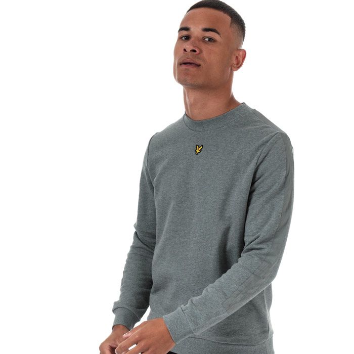 Mens Lyle And Scott Fabric Mix Crew Neck Sweatshirt in mid grey marl.<BR><BR>- Ribbed crew neck.<BR>- Long sleeves.<BR>- Tonal tape detail at shoulders and sleeves.<BR>- Embroidered eagle logo at centre chest.<BR>- Ribbed cuffs and hem.<BR>- Woven herringbone back neck tape.<BR>- Soft loopback cotton fleece construction.<BR>- Body: 100% Cotton.  Trim: 100% Nylon.  Machine washable.<BR>- Ref: ML1253VT28