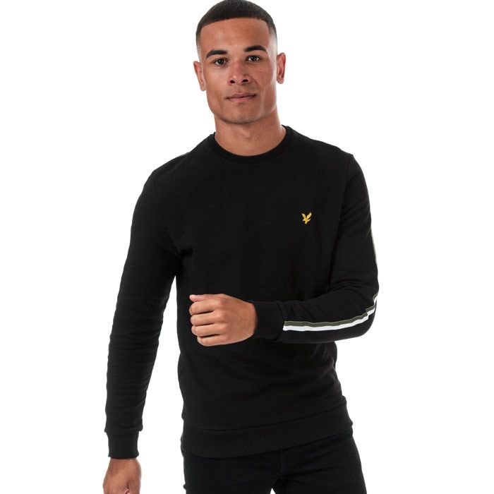 Mens Lyle And Scott Taped Crew Neck Sweatshirt in jet black - lichen green marl.<BR><BR>- Ribbed crew neck.<BR>- Long sleeves.<BR>- Retro-inspired two-tone tape at shoulders and sleeves.<BR>- Embroidered eagle logo at left chest.<BR>- Ribbed cuffs and hem.<BR>- Woven herringbone back neck tape.<BR>- Soft loopback cotton fleece construction.<BR>- Regular fit.<BR>- 100% Cotton. Machine washable.<BR>- Ref: ML1292VW267