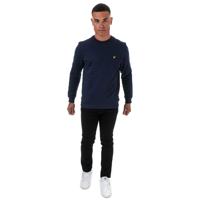 Mens Lyle And Scott Taped Crew Neck Sweatshirt in navy - gala red.<BR><BR>- Ribbed crew neck.<BR>- Long sleeves.<BR>- Retro-inspired two-tone tape at shoulders and sleeves.<BR>- Embroidered eagle logo at left chest.<BR>- Ribbed cuffs and hem.<BR>- Woven herringbone back neck tape.<BR>- Soft loopback cotton fleece construction.<BR>- Regular fit.<BR>- 100% Cotton. Machine washable.<BR>- Ref: ML1292VZ857