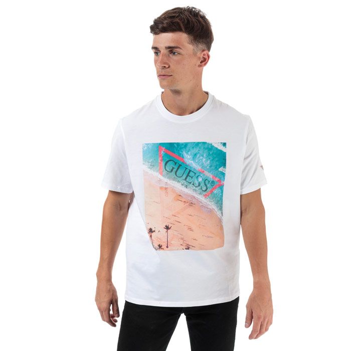 Mens Guess Waterline T-Shirt in white.<BR><BR>- Ribbed crew neck.<BR>- Short sleeves.  <BR>- Beach graphic print with Guess branding.<BR>- Woven Guess brand tab at left sleeve.<BR>- Tonal back neck tape.<BR>- Comfortable cotton jersey construction.<BR>- Regular fit.<BR>- 100% Cotton.  Machine washable.  <BR>- Ref: MOGI66
