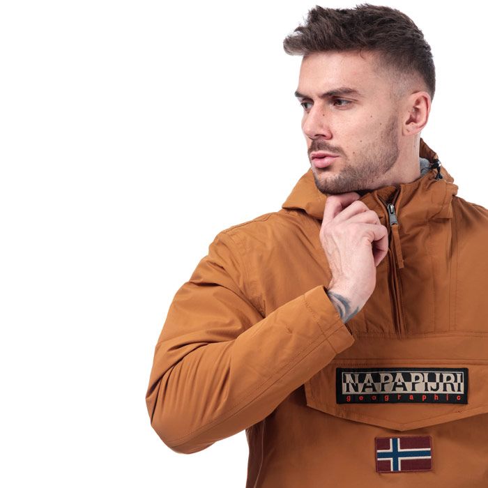 Mens Napapijri Rainforest Winter Jacket in Golden Brown.- Pull over jacket.- Drawcord adjustable hood.- Long sleeve with inner cuffs.- Flap pocket with zip fastening.- Ventilation eyelets.- Embroidered graphic to chest.- Flag badge to front.- Embroidered tab to seam.- Fleece lining and quilted padding.- Zip opening to side for easy on off.- Badge detail to left sleeve.- Shoulder to hem 27in approximately.- Body: 100% Polyamide  Lining: 100% Polyester. Machine Washable.- Ref: N0YGNJNC1Measurements are intended for guidance only