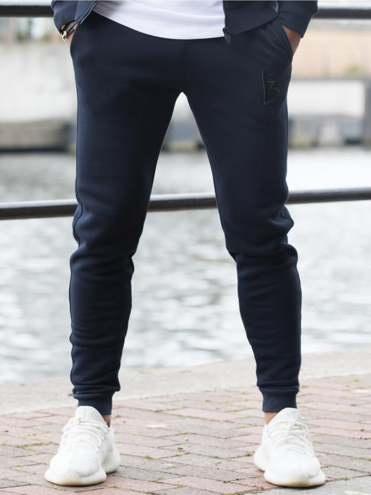  Bound By Honour Radiate Tracksuit Bottoms are ideal for casual everyday wear or in the gym. Crafted from cotton and polyester. The tracksuit bottom has been detailed with a signature design and a BBH embroidery on leg. Matching tracksuit Hoodie available.