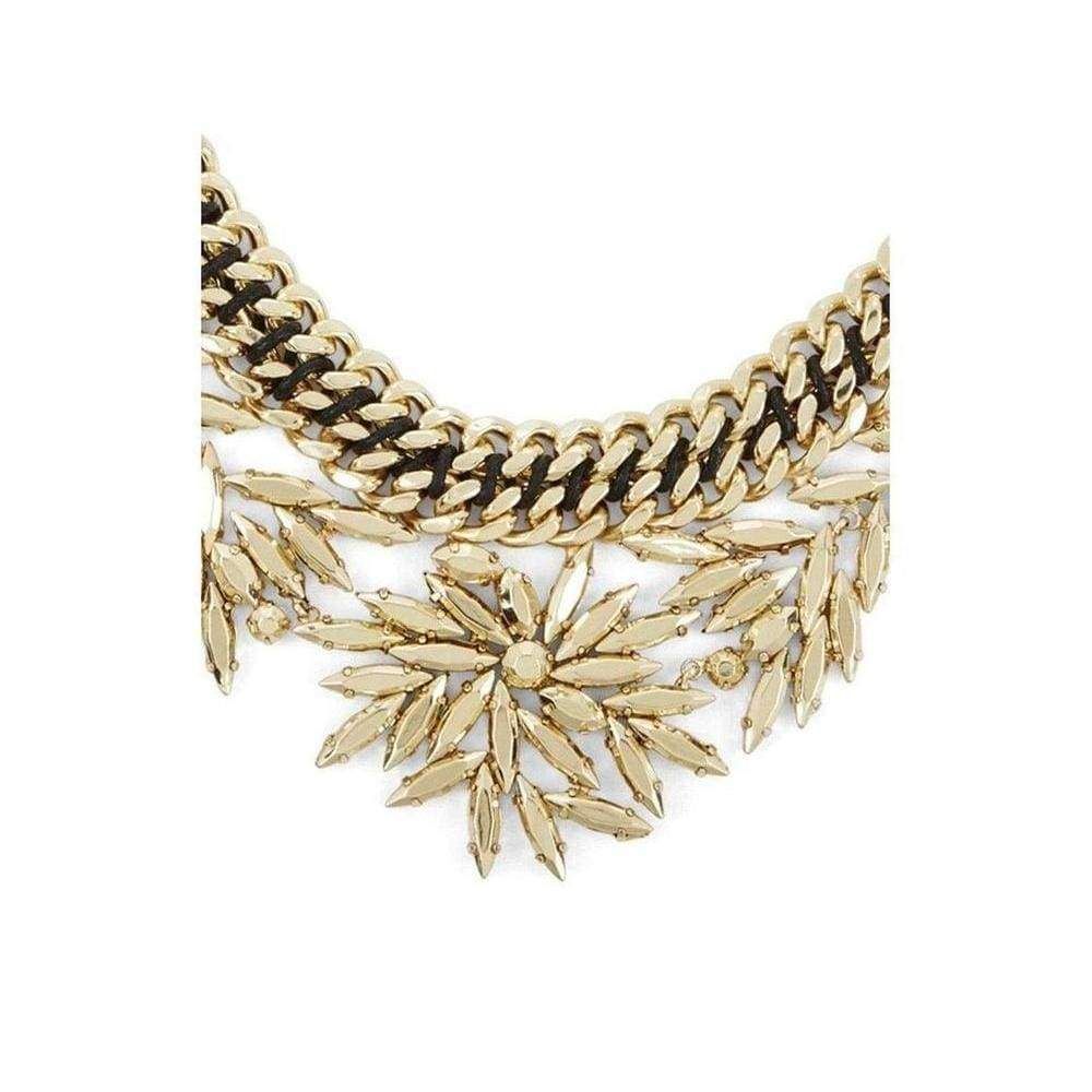 A natural motif of stone-embellished leaves gives this necklace the perfect look of sophistication to add to polished spring ensembles. Chain necklace with woven-fabric detailing. Leaves with prong-set faceted stone embellishments throughout. Adjustable lobster-clasp fastening. Material: Copper alloy. Measures approximately 16.5