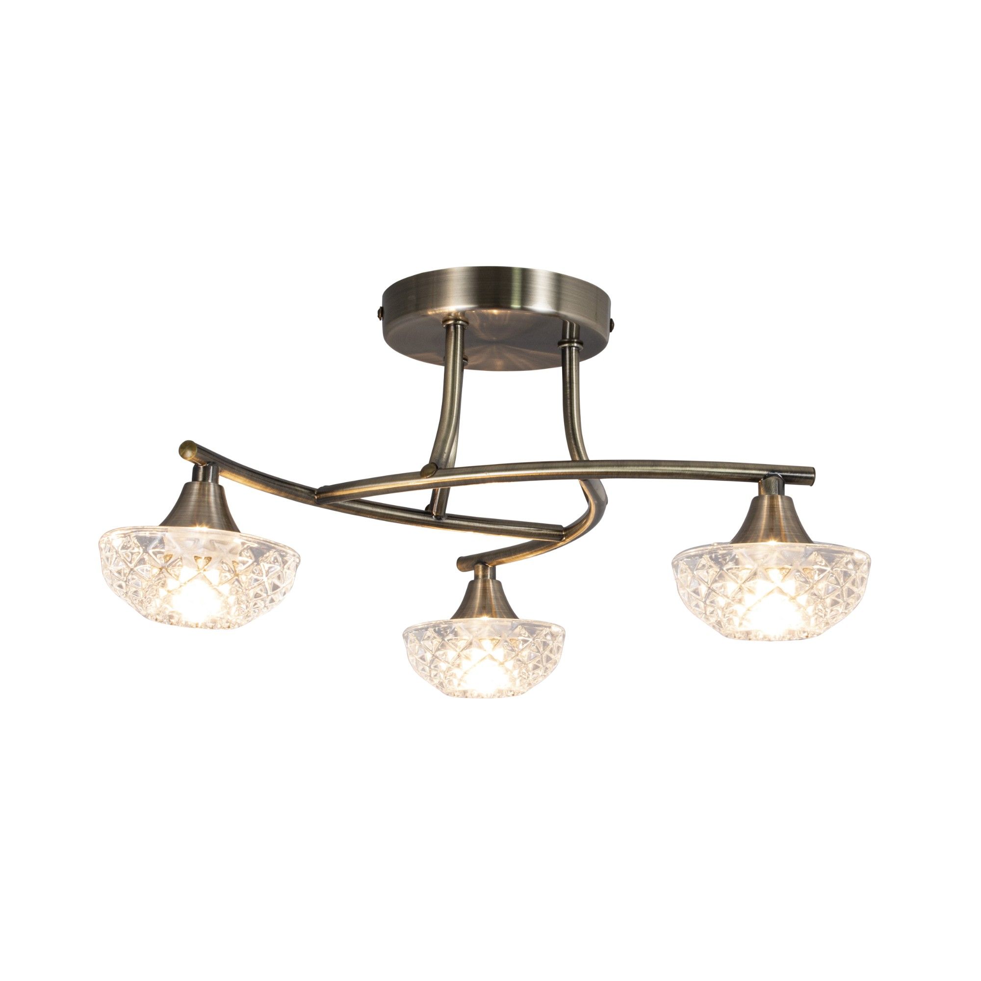The Paine 3 Light Semi-Flush Ceiling Light is a stunning fitting from Pagazzi Lighting. Boasting an antique brass finish throughout, the piece features a round ceiling plate with 3 curved arms attached. Completing the piece is half dome, clear cut glass shades which illuminate beautifully. Feature this antique brass ceiling light in living rooms and hallways for a classic look. Pagazzi Exclusive
Height: 18.5cm
Diameter: 40cm
Dimmable: Yes 
Maximum Wattage: 28w 
Light Bulb: 3 x G9 Capsule Light Bulbs (Not Included)