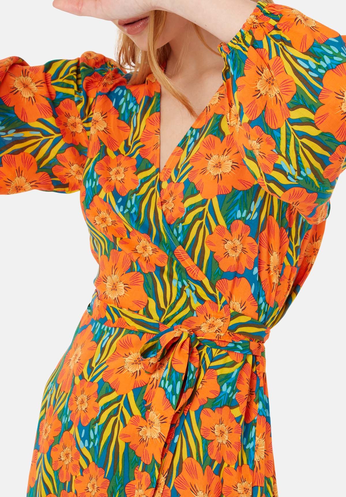 Scattered in a bold tropical floral print, the Mutiny Mini Wrap Dress is perfect for your summer wardrobe. This elegant and dreamy design is crafted to a signature wrap silhouette and complete with a v-neckline and long sleeves. 100% Viscose. Machine Wash at 30c.