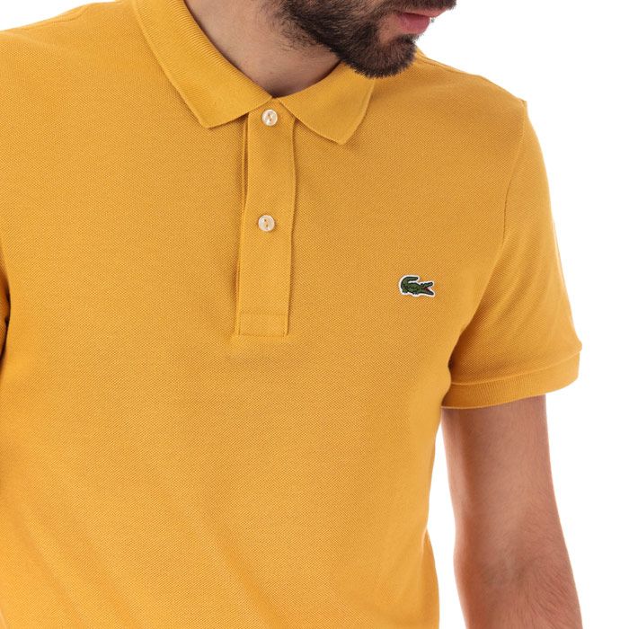 Mens Lacoste Slim Fit Petit Polo Shirt  Yellow. <BR><BR>- Signature design. <BR>- Cotton pique combines comfort and elegance.<BR>- Slim fit.<BR>- Ribbed collar and armbands.<BR>- 2-button placket.<BR>- Green crocodile embroidered on chest. <BR>- Cotton 100%. Machine washable.<BR>- Ref: PH4012004BW.