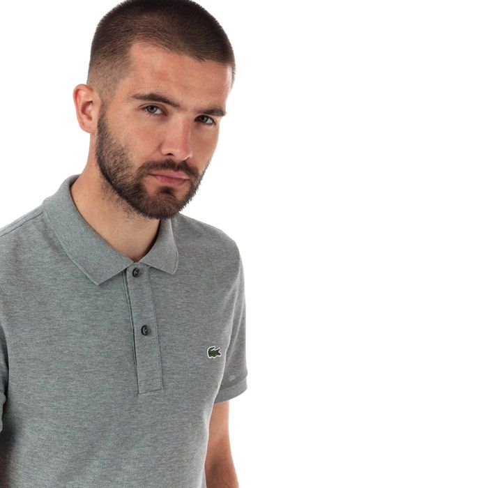 Mens Lacoste Slim Fit Petit Pique Polo Shirt  Grey.<BR><BR>- Classic buttoned collar.<BR>- Cotton poplin.<BR>- Regular fit.<BR>- Embroidered green crocodile branding on chest. <BR>- 100% cotton. Machine washable.<BR>- Ref: PH4012009MN.