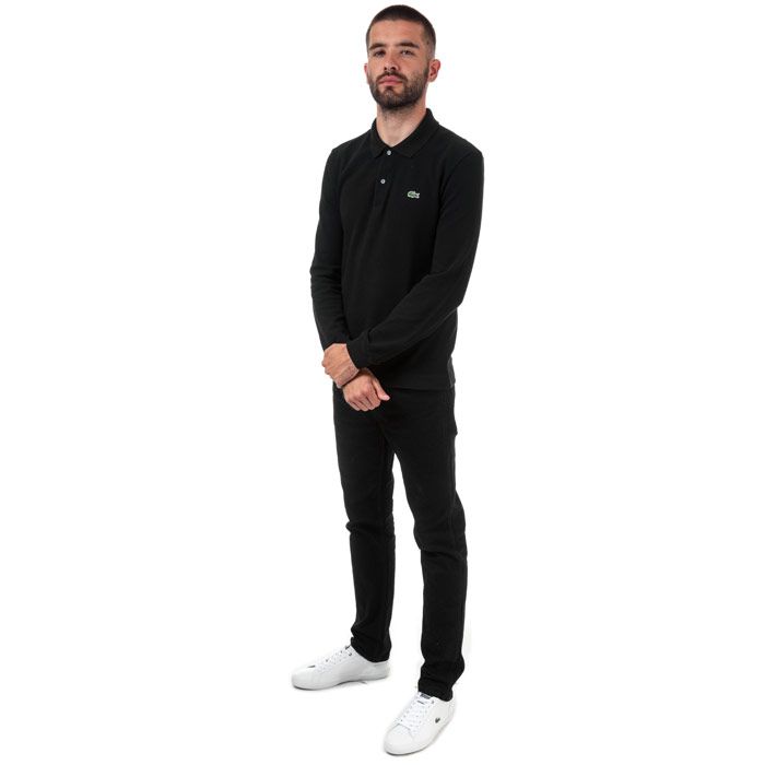 15 Mens Lacoste Slim Fit Long Sleeve Polo  Black. <BR><BR>- Two-ply cotton petit pique.<BR>- Two-button collar.<BR>- Slim fit.<BR>- Ribbed finishes at neckline and wristbands.<BR>- Embroidered green crocodile applique on chest.<BR>- Cuff rib; Cotton 95%  Elastane 5%. Main fabric; Cotton 100%. Machine washable.<BR>- Ref: PH401300031.