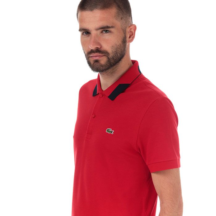 Mens Lacoste Regular Fit Stretch Pima Pique Polo Shirt  Red.<BR><BR>- Unicolor stretch Pima Cotton Pique. <BR>- Polo collar with two tone-on-tone rubber touch buttons. <BR>- Regular fit.<BR>- Embroidered green crocodile branding on chest. <BR>- Main fabric; 96% cotton  Elastane 4%. Collar; 100% cotton. Sleeve bottom; 100% cotton. Machine washable.<BR>- Ref: PH423000240.