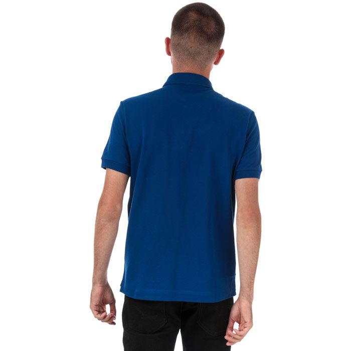 Mens Lacoste Regular Fit Paris Stretch Cotton Pique Polo Shirt  Blue. <BR><BR>- Signature design. <BR>- Unicolour stretch cotton piqué.<BR>- Regular Fit.<BR>- Ribbed collar and armbands.<BR>- 2-button placket.<BR>- Embroidered tone-on-tone crocodile on chest.<BR>- Cotton 94%  Elastane 6%  Machine washable.<BR>- Ref: PH552200X0U.