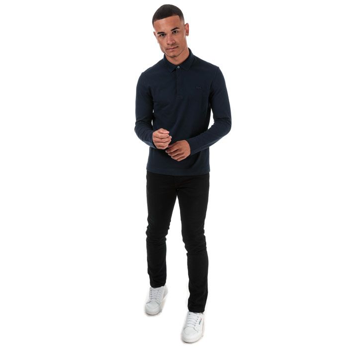 Mens Lacoste Regular Fit Paris Long Sleeve Stretch Cotton Pique Polo Shirt  Navy. <BR><BR>- Signature design. <BR>- Unicolour stretch cotton piqué.<BR>- Regular Fit.<BR>- Ribbed collar and armbands.<BR>- Shirt collar with concealed button placket.<BR>- Embroidered tone-on-tone crocodile on chest.<BR>- Cotton 94%  Elastane 6%  Machine washable.<BR>- Ref: PH943500166.