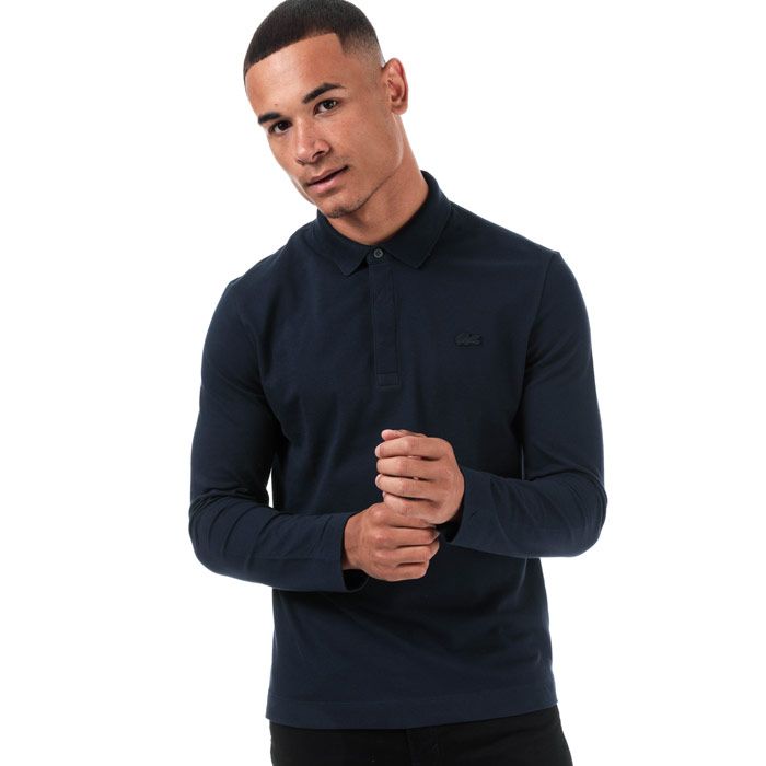 Mens Lacoste Regular Fit Paris Long Sleeve Stretch Cotton Pique Polo Shirt  Navy. <BR><BR>- Signature design. <BR>- Unicolour stretch cotton piqué.<BR>- Regular Fit.<BR>- Ribbed collar and armbands.<BR>- Shirt collar with concealed button placket.<BR>- Embroidered tone-on-tone crocodile on chest.<BR>- Cotton 94%  Elastane 6%  Machine washable.<BR>- Ref: PH943500166.