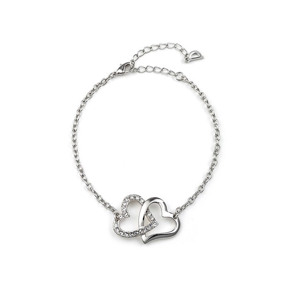 Double Heart Bracelet made with a white Crystal from Swarovski This bracelet is made of two interlaced hearts. The first one is in rhodium plated and the second one is set with a white Crystal from Swarovski. Mounting: Rhodium plated Length: 16 cm (+4 cm adjustable)