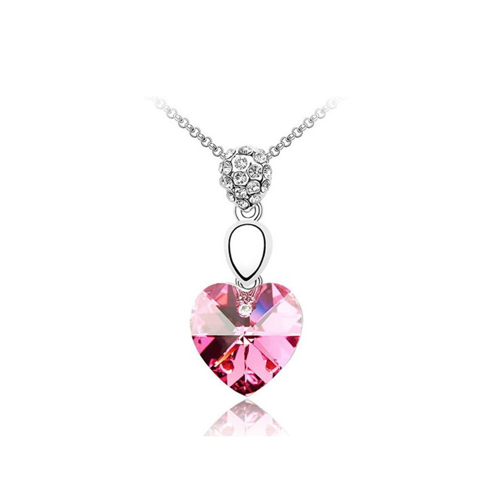 Heart Pendant made with a Pink Crystal from Swarovski This wonderful heart-shaped pendant is made with a pink Crystal from Swarovski. Mounting: 18K White gold plated (3 layers), set with white crystals. Pink Crystal from Swarovski White Rhinestones Size: 32 x 14 mm. Included chain: 40 cm.