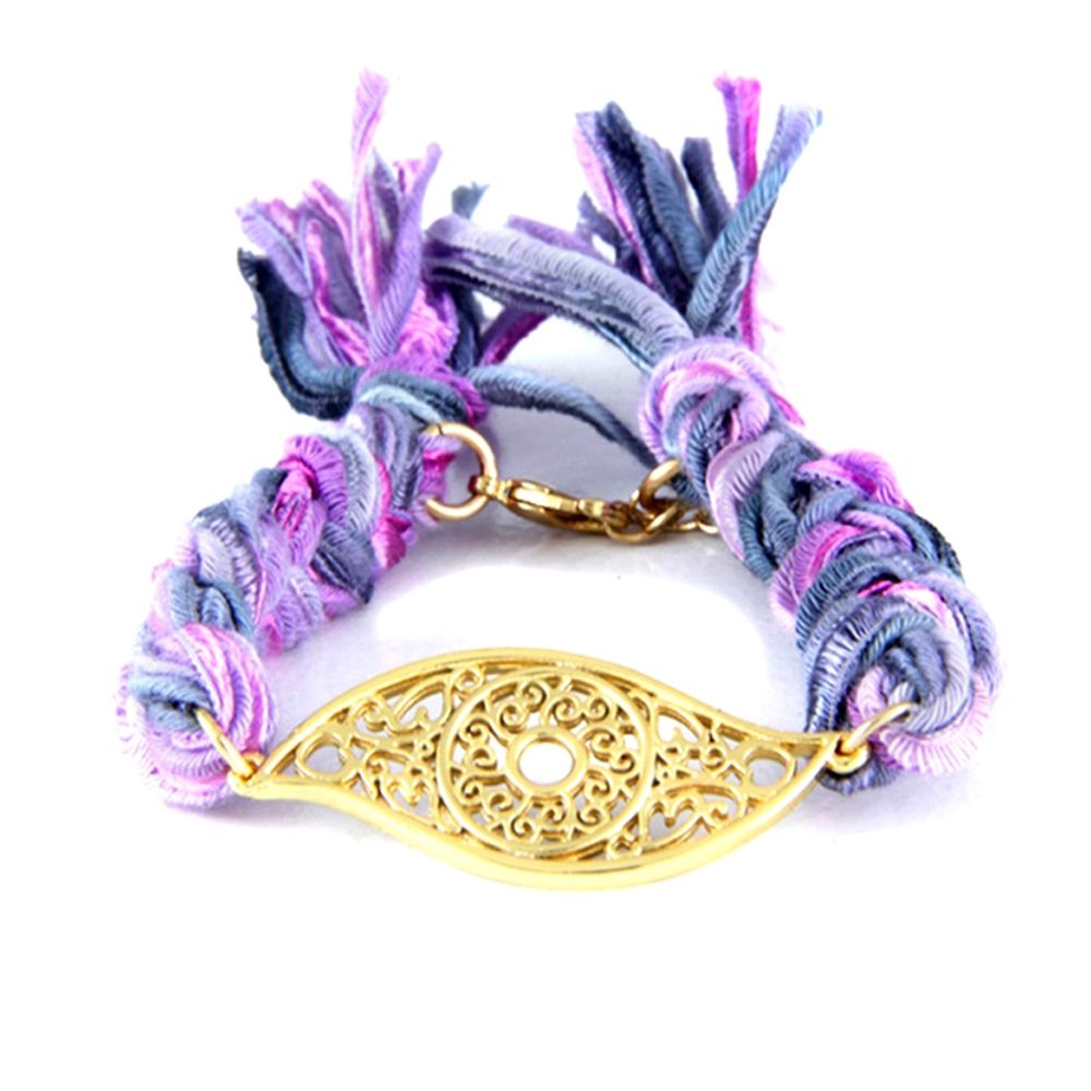 Ettika - Purple Ribbons and Yellow Gold Eye Bracelet This bracelet Ettika came from the United States , handmade is of outstanding quality . An Eye plated yellow gold is at the center of the bracelet. Ribbons braided cotton purple , blue and pink are connected to the eye . A wonderful message of peace and love or friendship to offer or afford ! Combine with other Ettika bracelets for a colorful effect and vitamin superposition ! Frame plated yellow gold . Closure: Snap with adjustable chain ( 2 cm) Length: 15 cm Width : 1.5 cm Eye dimensions : 4 cm x 1.7 cm Cotton: Purple, Blue and Pink - Ettika is a registered after the California sun . Its designers offer unique collections and send a message in their own way . All models are handmade and offer different materials and quality. In the United States, Stars like Eva Longoria , Jessica Alba and Bar Refaeli are fighting over , this is an essential accessory for the summer !