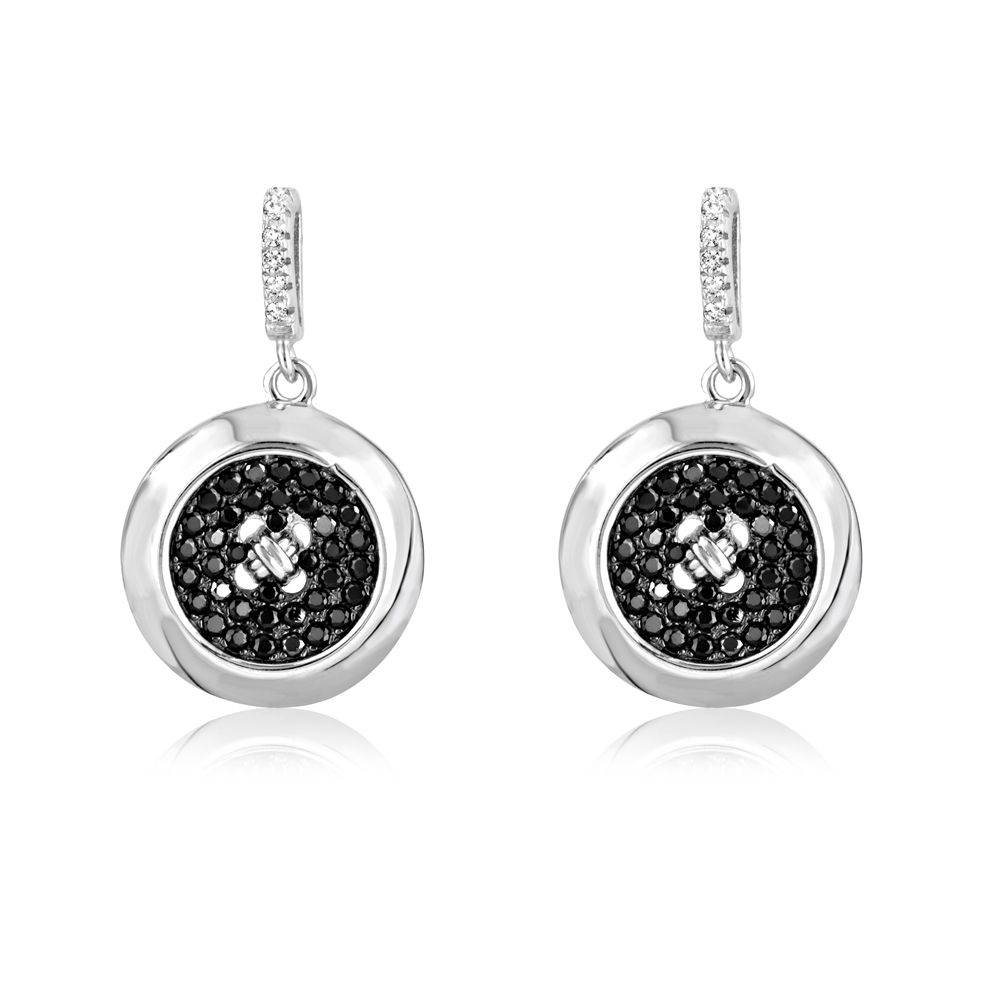 Silver Earrings and 88 Black and White Swarovski Crystals Cubic Zirconia This jewel has a design that is both classic and contemporary, and is remarkable for its elegance. This beautiful pair of earrings is entirely set with 58 beautiful semi precious Swarovski crystals black and white Cubic Zirconia: giving it intense reflections at the height of the diamond. A yellow crystal overlooks the mount. Mount Silver Rhodium Plated 925/1000 end to a perfect finish. 88 Swarovski Cubic Zirconia 5A Dimensions: 1.6 x 2.7 cm Weight: 5.52 gr Suitable for pierced ears.