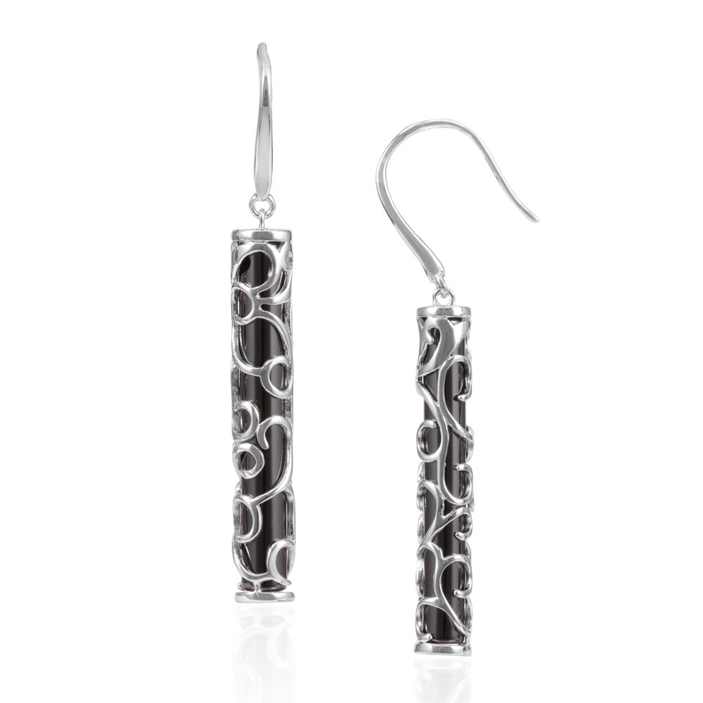 Black Ceramic Tiki Earrings and 925 Silver This jewel has a design that is both classic and contemporary, and is remarkable for its elegance. This beautiful pair of dangling earrings is made of black ceramic. The mount is Sterling Silver 925/1000 for a perfect finish. A unique and original jewelry that will attract attention and easy to wear on all occasions. Dimensions: 4.6 x 0.4 cm Suitable for pierced ears