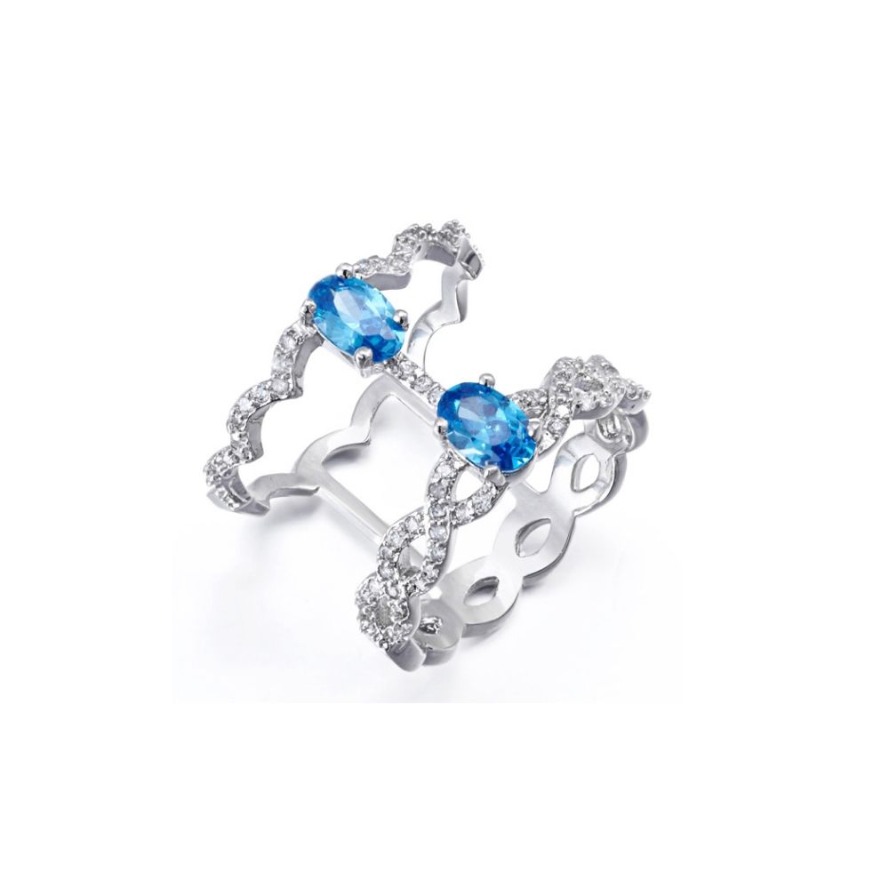White and Blue Swarovski Elements Crystal Ring This dazzling ring is made of Swarovski Elements white and blue to intense reflections. The frame is made of alloy of high quality Rhodium plated for a perfect finish. With its unique design, this gem will add elegance and brightness for any occasion key. Ring width: 1.6 cm