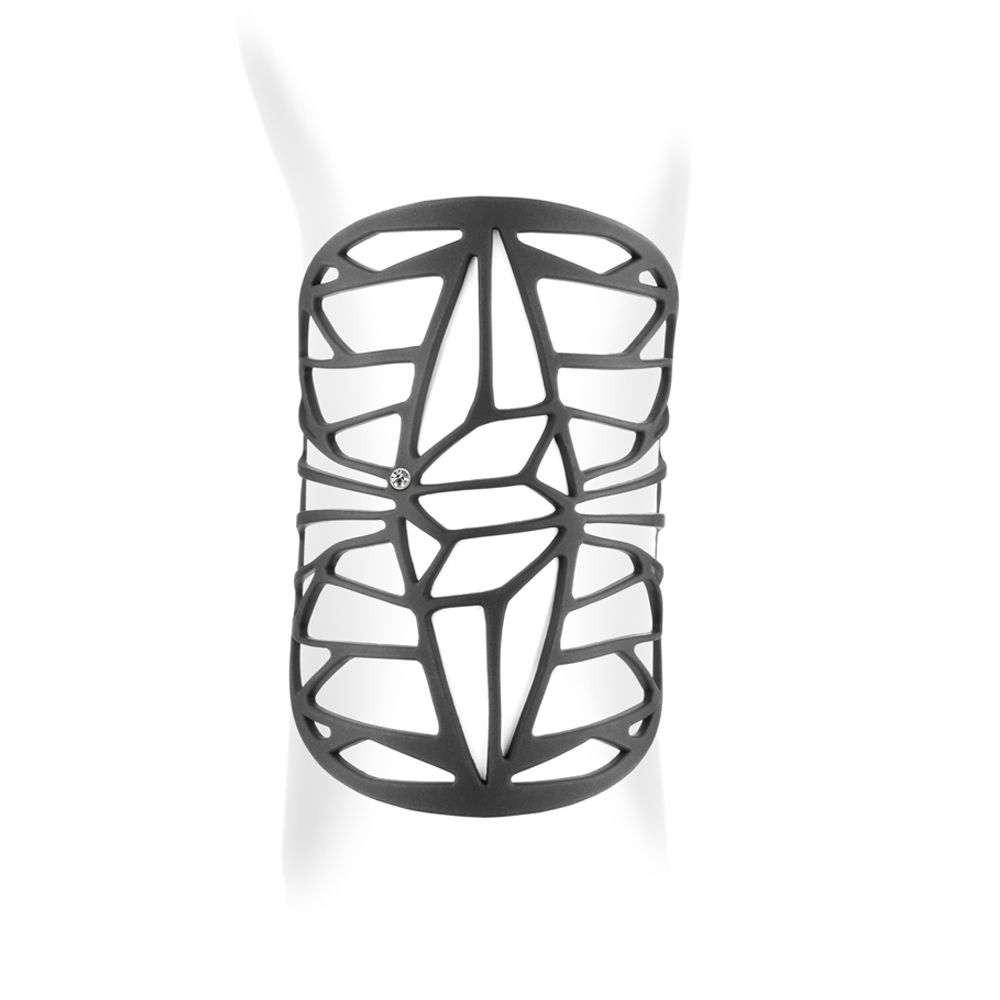 Design Cuff Bracelet - GUM JEWELRY Made of black silicone gum it has many advantages. Anti allergic it will suit all people not supporting the metals. Very nice to wear this material is lightweight, very soft, like a second skin for a tattoo effect. Malleable and deformable, you can fold it, put it away, manhandle this jewel will resume its original shape. Ideal to take it anywhere with you. Very durable you can wear it in all circumstances as at the beach or pool. Material : silicone Adjustable length: 16 to 21 cm Thickness: 2 mm Weight: 9 gr Optional with or without Swarovski Elements crystal