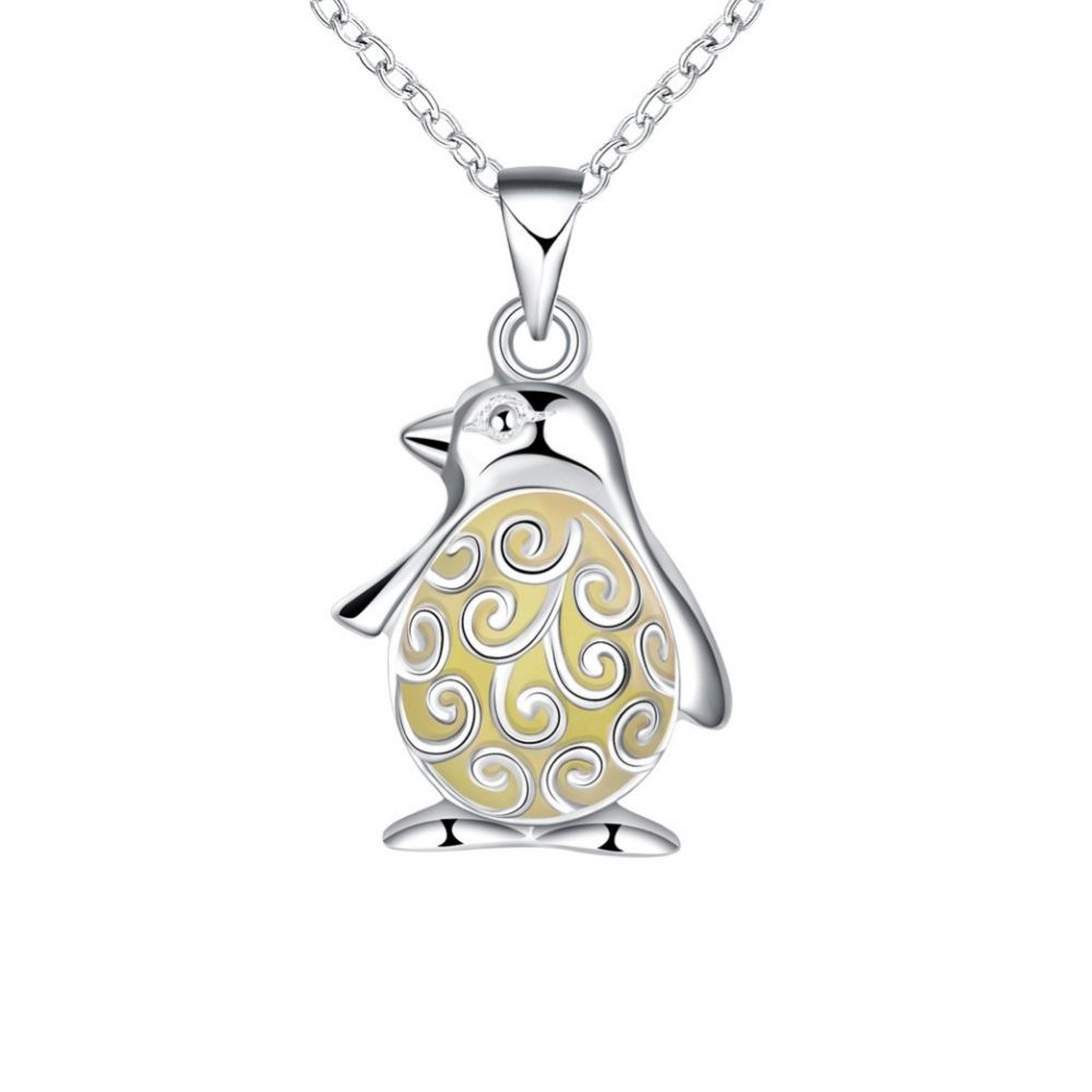 Blue Fluorescent penguin Pendant Very original this necklace composed of a Elephant pendant containing a fluorescent stone. It will come alive in blue in the night ! Frame: Silver plated Dimension: 2.6 x 1.2 cm Length of the chain: 50 cm Weight: 2.8 g