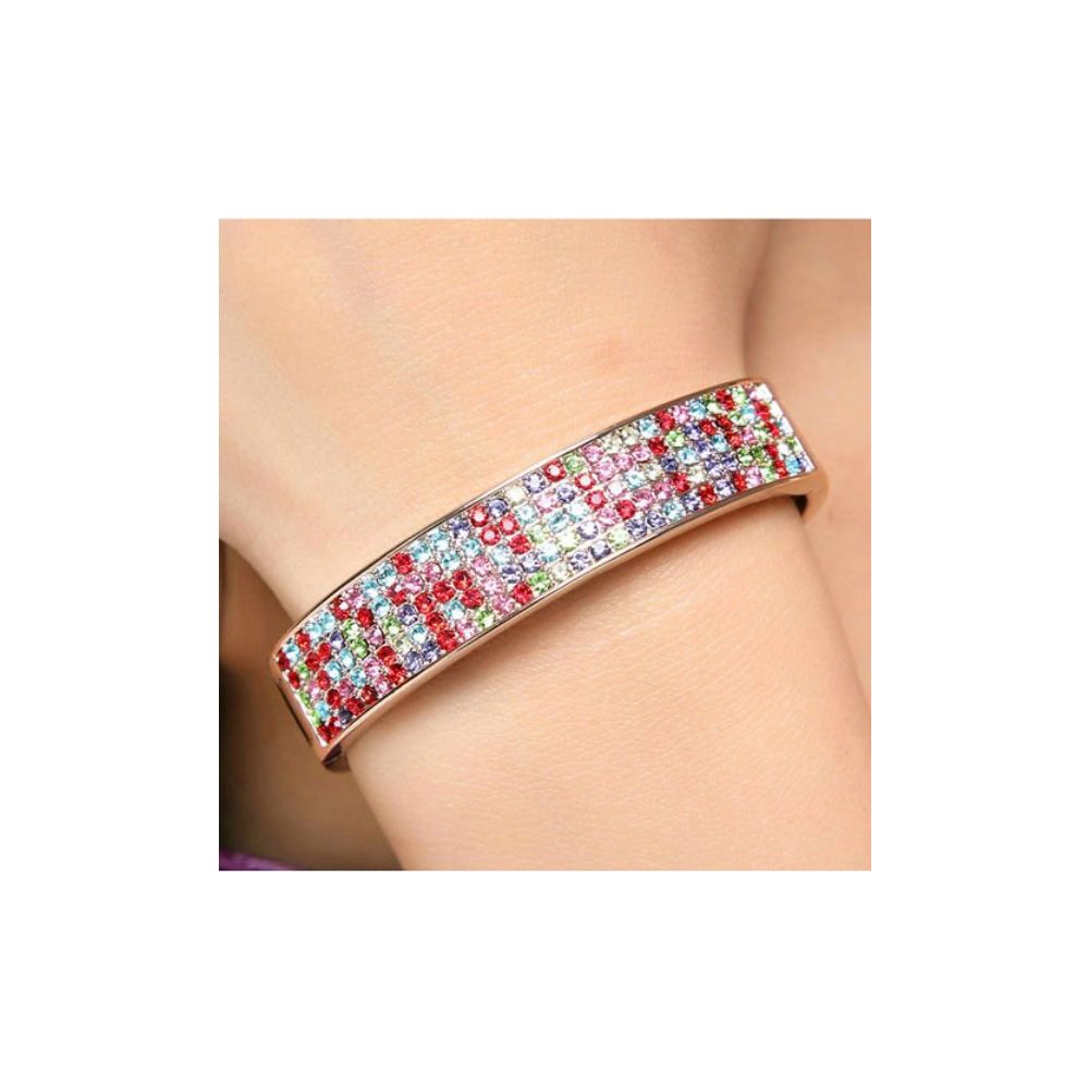 Bangle Bracelet made with a Multicolor Crystal from Swarovski and White Gold plated This bangle bracelet is in 18K white gold plated. It is made with 4 strands of multicolor Crystals from Swarovski. Diameter : 55 x 45 mm Width: 12.5 mm