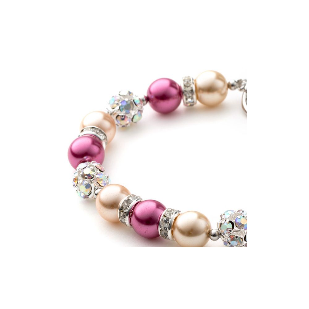 Orange and Pink Pearls, Crystal 1 Row Bracelet This charming bracelet is made of synthetic beads orange and pink Pearls are set with white crystals. Frame high quality alloy Rhodium plated for a perfect finish and extreme shine. Elegant and original, this is the perfect accessory for a night or to illuminate a simple outfit. description: Type of Clasp: Toggle Bracelet Diameter: 17.5 cm Bead diameter: 5 to 8 mm Color: Pink / Orange