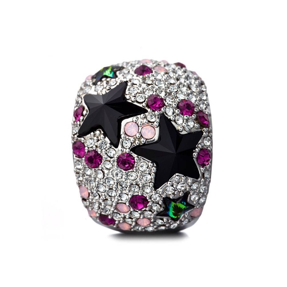 Stars Dome Ring in Crystal Swarovski Elements This dazzling ring is made of Swarovski crystals in the shape of stars and pink and black multi-colored reflections. Many white crystals are set and distributed around stars. The frame is alloy high quality Rhodium plated for a perfect finish. With its unique design, this gem will add a touch of elegance and shine for any occasion. Ring width: 20 mm