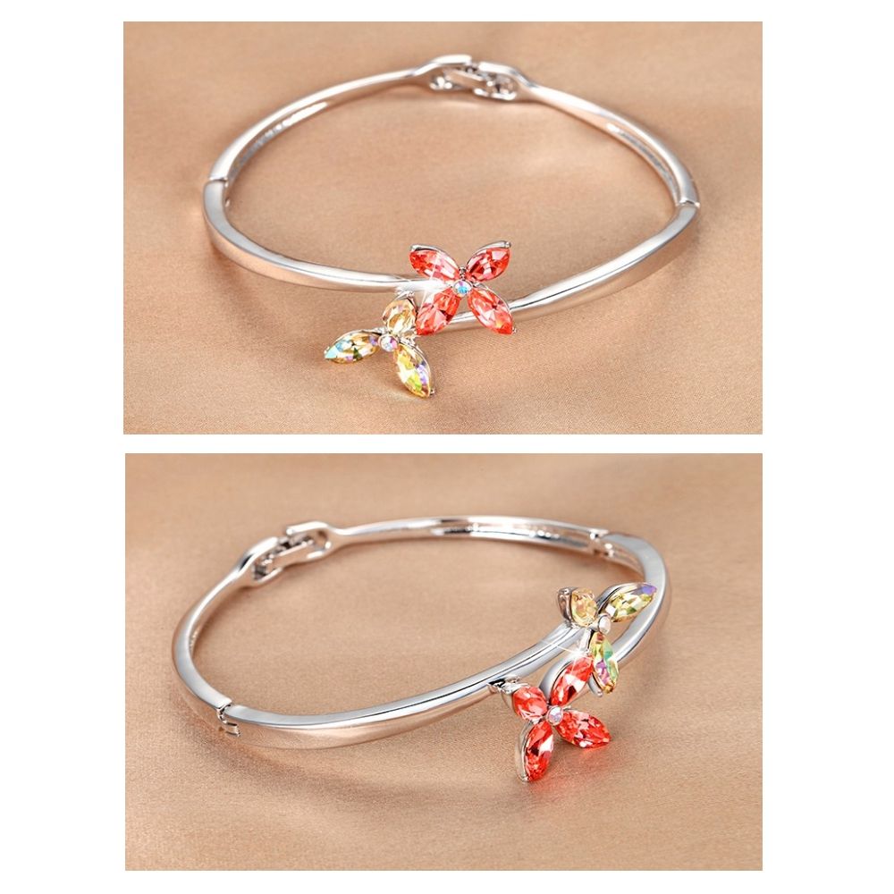 Pink and White Swarovski Crystal Elements Flower Bracelet Bangle This beautiful bracelet bangle type is composed of two flowers. The first is set with Swarovski crystals white shimmering rainbow Elements. The second is set with crystals Swarovski Elements roses. The center flower is represented by a small white crystal. Alloy frame high quality Rhodium plated for a perfect finish. A beautiful bracelet refined and elegant design. Flower size: 3x2.1 cm Diameter: 65 mm