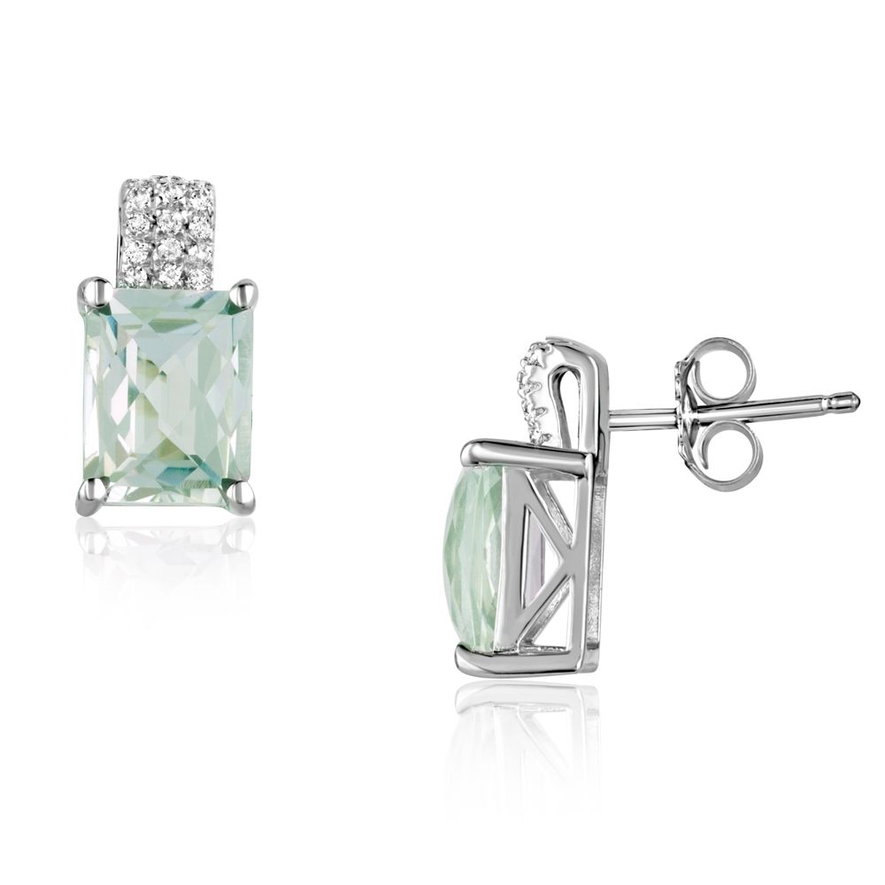 26 White Swarovski Zirconia and Light Green Amethyst and 925 Silver Earrings This jewel has a design classic and contemporary times and is remarkable for its elegance. This beautiful pair of earrings is entirely set with 26 beautiful semi precious Swarovski crystals White Cubic Zirconia: giving it intense reflections at the height of the diamond. A light green crystal is placed in the center of the small crystals. Mount Silver Rhodium Plated 925/1000 end to a perfect finish. 26 Swarovski Cubic Zirconia 5A 1 Green Amethyst Dimensions: 1.4 x 0.8 cm Weight: 3.7 gr Suitable for pierced ears. This magnificent creation, easy to wear on any occasion will add a touch of elegance.