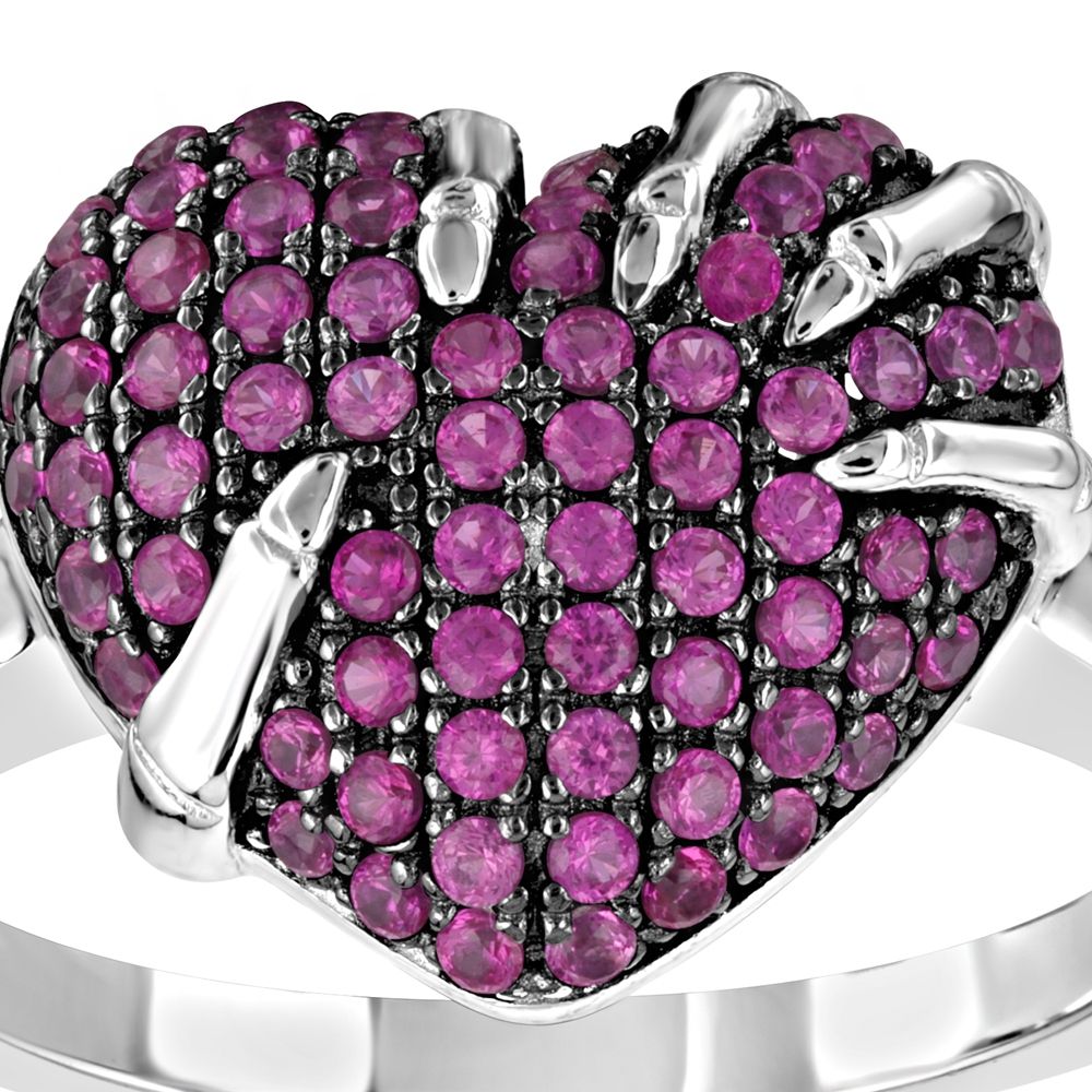 71 White and Pink Swarovski Crystal Zirconia Heart Ring and 925 Silver This beautiful ring in the shape of hearts, consists of 71 white and pink semi precious Swarovski crystals Zirconia. With its unique design, this gem will add elegance and brightness for any occasion key. 925/1000 Sterling Silver and Rhodium Plated. 71 Swarovski Cubic Zirconia 5A Dimensions: 1.3 x 1.3 cm Weight: 3.42 gr