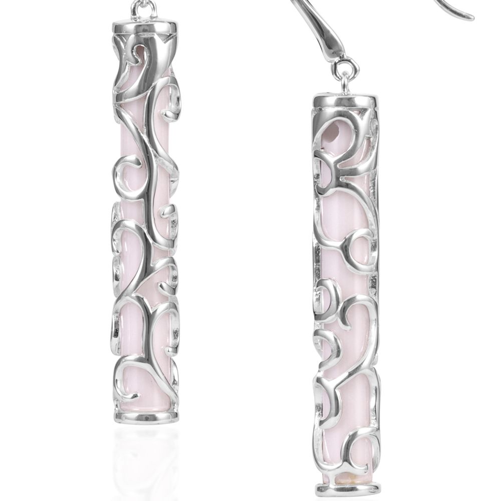 White Ceramic Tiki Earrings and 925 Silver This jewel has a design that is both classic and contemporary, and is remarkable for its elegance. This beautiful pair of dangling earrings is made of white ceramic. The mount is Sterling Silver 925/1000 for a perfect finish. A unique and original jewelry that will attract attention and easy to wear on all occasions. Dimensions: 4.6 x 0.4 cm Suitable for pierced ears