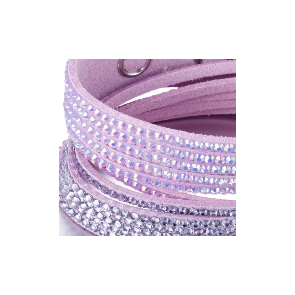 White and Purple Swarovski Crystal Elements and Purple Velvet 3 Rows Bracelet This beautiful bracelet, double turn, purple velvet has 3 rows. These rows are set with a multitude of white Swarovski Elements crystals and intense violet reflections. The clasp, stainless steel is pressure for easy and quick handling. The length is adjustable thanks to its 2 snaps. This bracelet sparkles and you sublimate at your parties! Dimensions: 39 cm x 2 cm Succumb to the beauty of this bracelet that will not disappoint.