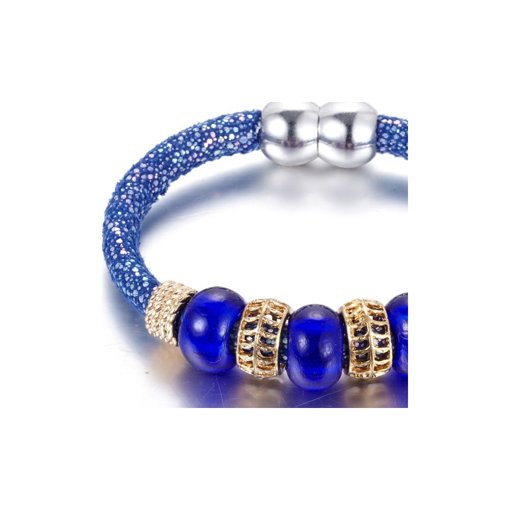 Blue Glass Beads Bracelet and Steel Gold This beautiful bracelet is made of 3 blue glass beads. Gold colored steel elements intercallent pearls. Length: 19 cm The magnetic clasp is made of stainless steel. This bracelet sparkles and you sublimate at your parties! Succumb to the beauty of this bracelet that will not disappoint.