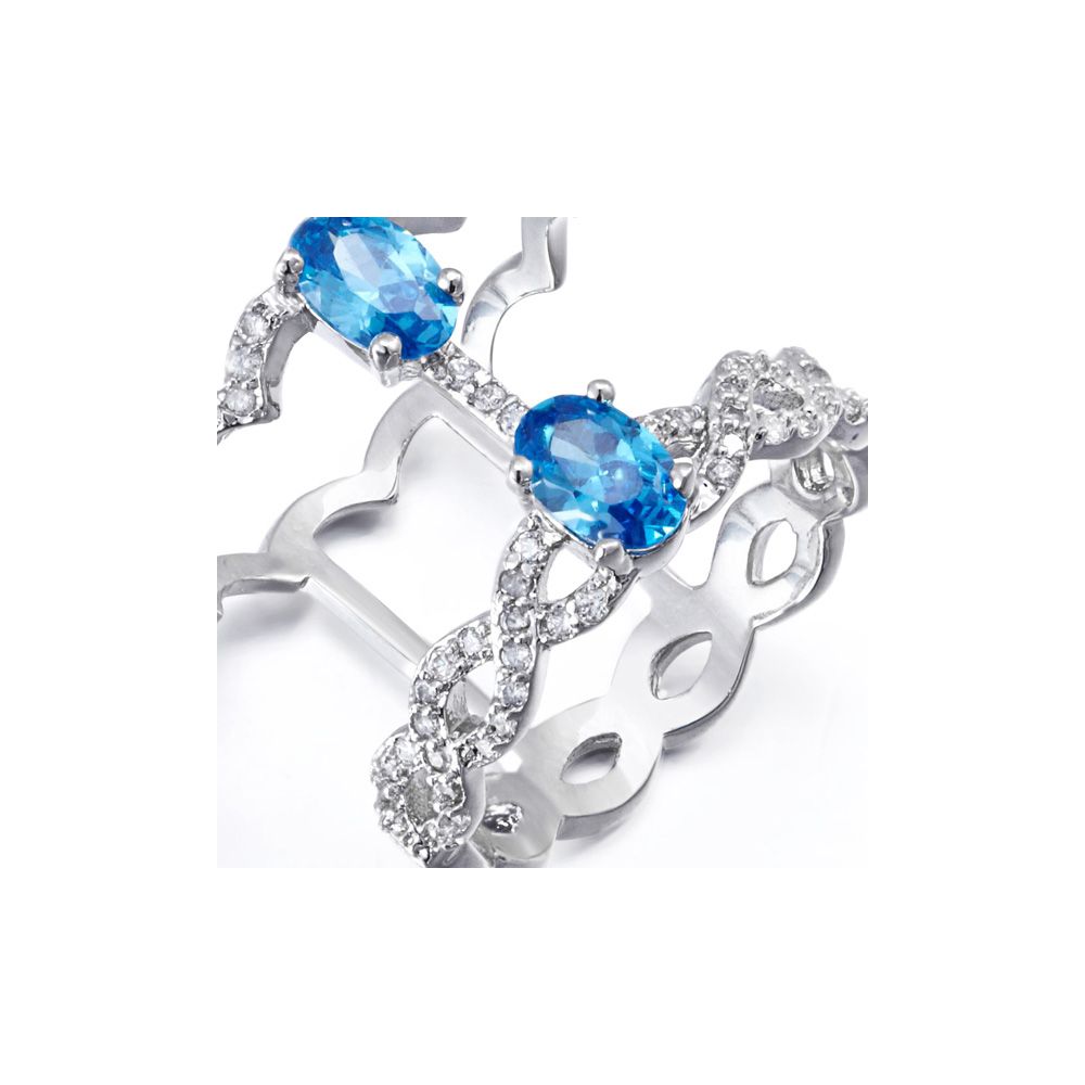 White and Blue Swarovski Elements Crystal Ring This dazzling ring is made of Swarovski Elements white and blue to intense reflections. The frame is made of alloy of high quality Rhodium plated for a perfect finish. With its unique design, this gem will add elegance and brightness for any occasion key. Ring width: 1.6 cm