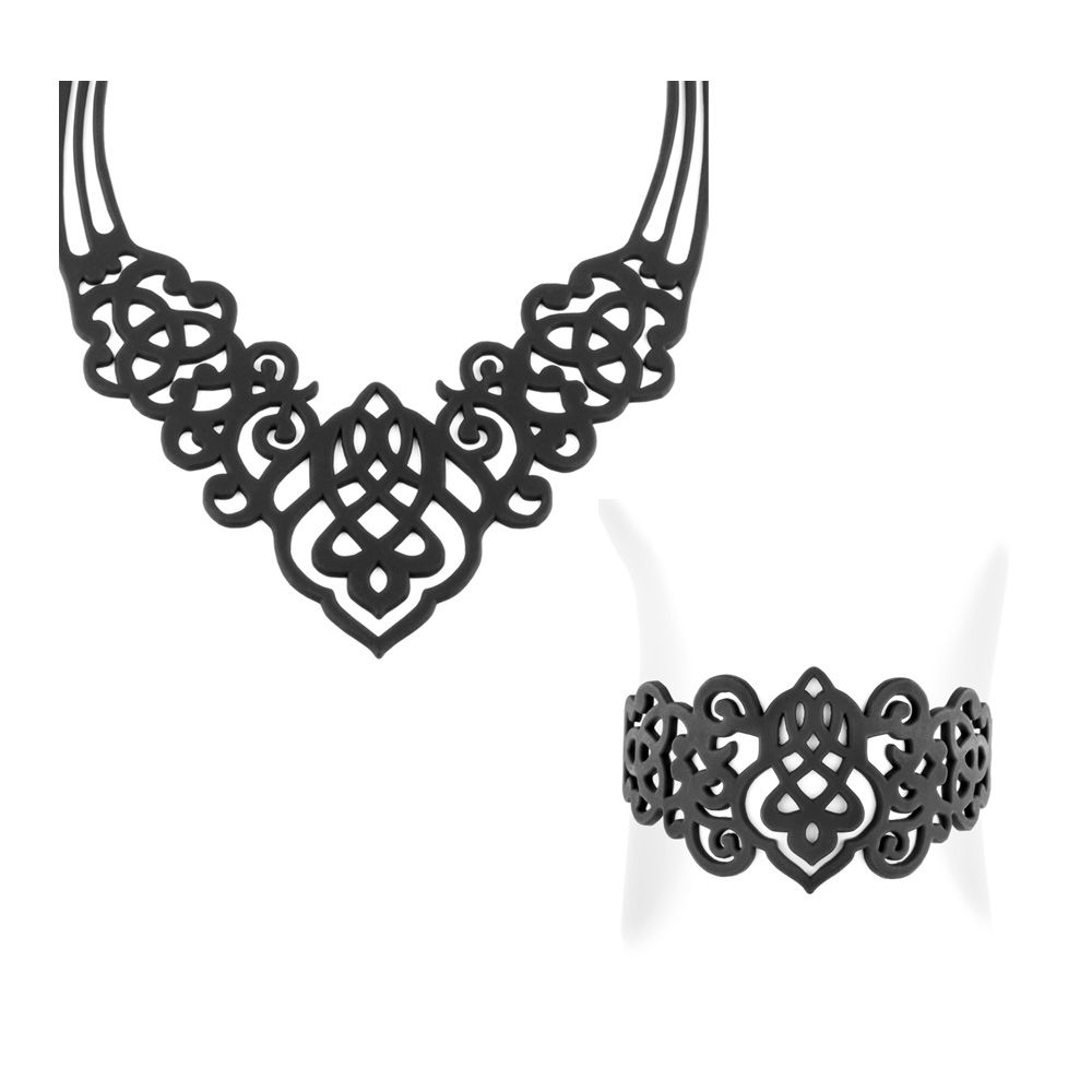 Arabesque Necklace and Bracelet Set - GUM JEWELRY Magnificent French creation with an oriental and Celtic look. Made of black silicone gum it has many advantages. Anti allergic it will suit all people not supporting the metals. Very nice to wear this material is lightweight, very soft, like a second skin for a tattoo effect. Malleable and deformable, you can fold it, put it away, manhandle this jewel will resume its original shape. Ideal to take it anywhere with you. Very durable you can wear it in all circumstances as at the beach or pool. Descrption Necklace : Material : silicone Adjustable length: 41 to 45 cm Thickness: 2 mm Weight: 20 gr Descrption Bracelet : Material : silicone Adjustable length: 41 to 45 cm Thickness: 2 mm Weight: 20 gr Optional with or without crystal Swarovski Elements