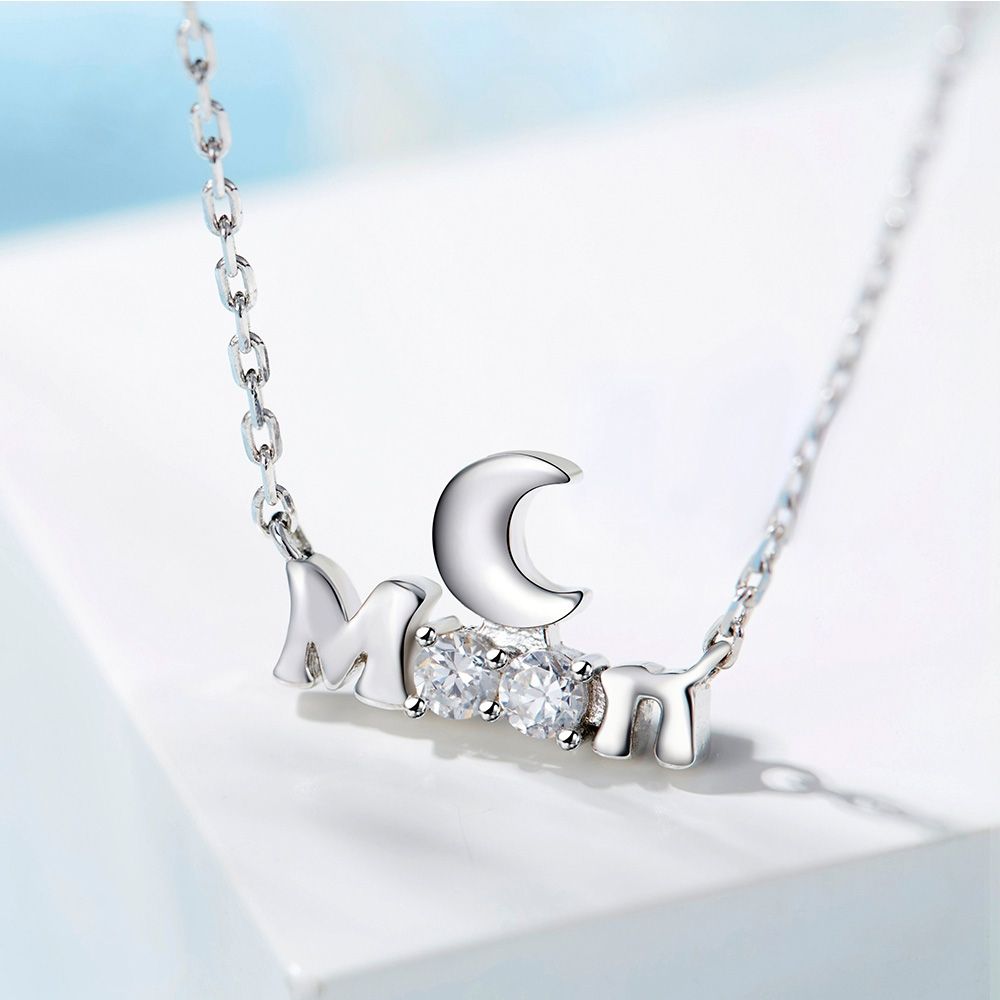 White Swarovski Crystal Elements Moon Necklace This necklace, composed of a Moon and the word 