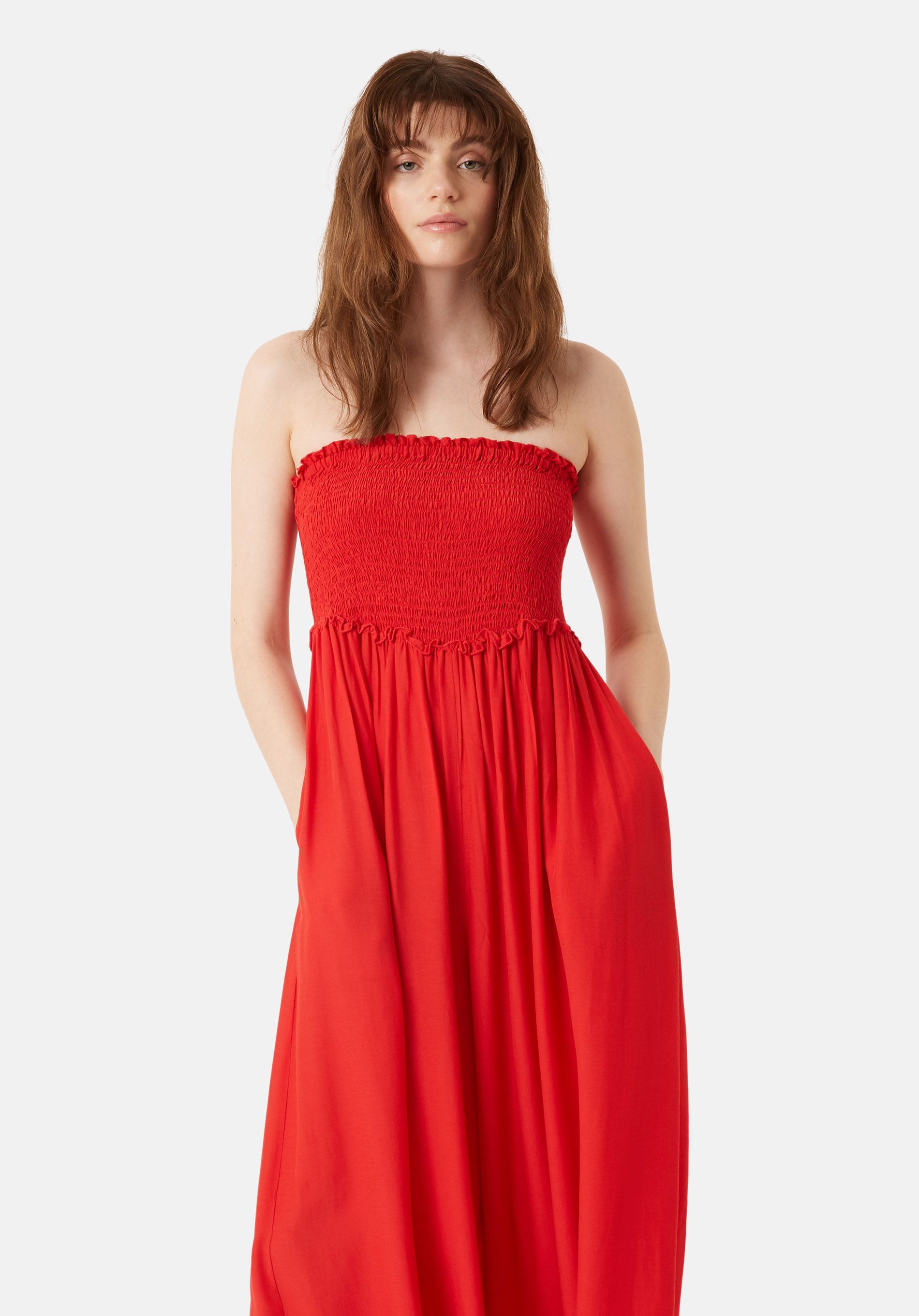 The Smock Jumpsuit is a sophisticated design to elavate your daywear. Realised in a deep red shade, this stretch-cady one-piece is cut to a sleek strapless fit, before it tumbles to a soft flared wide leg. 70% Viscose, 30% Polyester. Machine Wash at 30c