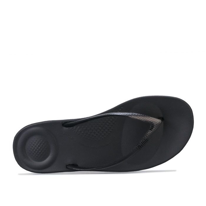 Womens iQushion Ergonomic Flip-Flops Black. <BR><BR>- Biomechanically engineered  comfortable toe-thong flip flops<BR>- Pearlised  snakeprint-embossed uppers with embossed FitFlop logo.<BR>- iQUSHION midsole is made with ultra-light  flexible air-foam cushioning with impact pillows at front and back.<BR>- Anatomically shaped footbed for all-day comfort.<BR>- Built-in arch contour<BR>- Flexible  slip-resistant rubber outsole.<BR>- Average width.<BR>- Heel height 1“ - 2.5cm approximately.<BR>- Synthetic upper  Synthetic lining  Synthetic sole.<BR>- Ref: R07001