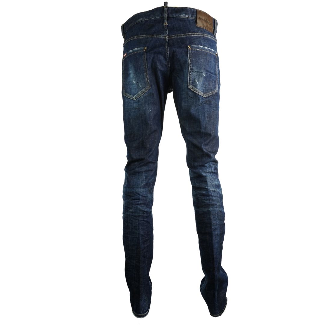 Dsquared2 Cool Guy Jean Paint Spray Jeans. D2 Cool Guy Jean S71LB0629 S30342 470. Stretch Denim 98% Cotton 2% Elastane. Button Fly. Slim Fit With A Tapered Leg. Large Branded Badge ,Paint Splash Detail, Destroyed Reinforced Denim