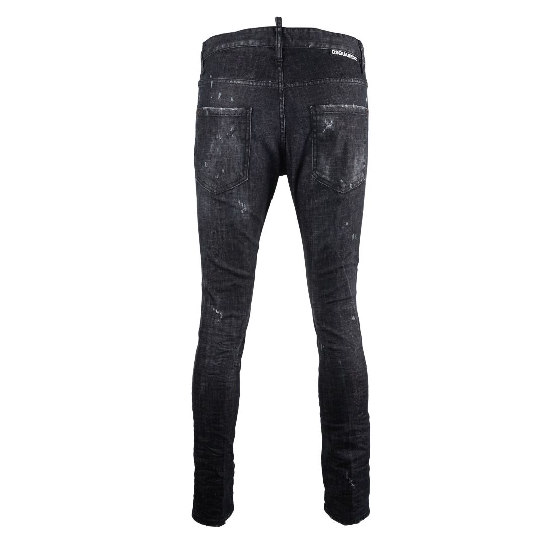 Dsquared2 Skater Jean Worn Faded Black Jeans. Dsquared2 Skater Jean S71LB0658 S30357 900. Stretch Denim 98% Cotton 2% Elastane. Button Fly, Worn and Faded Denim. Slim Fit With A Tapered Leg. Branded Badge